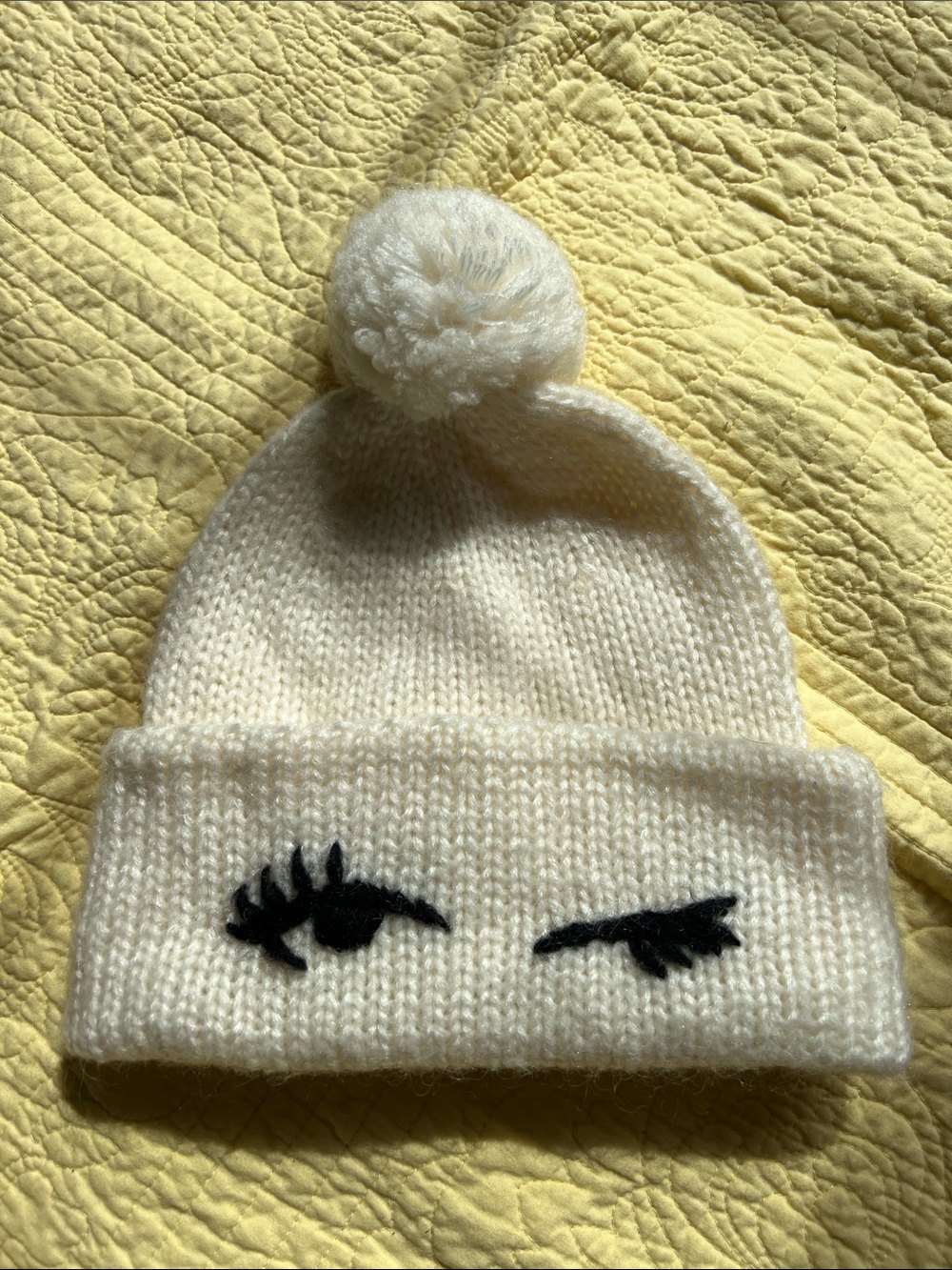 kate spade Knit Pom Beanie with Black Wink Motif
